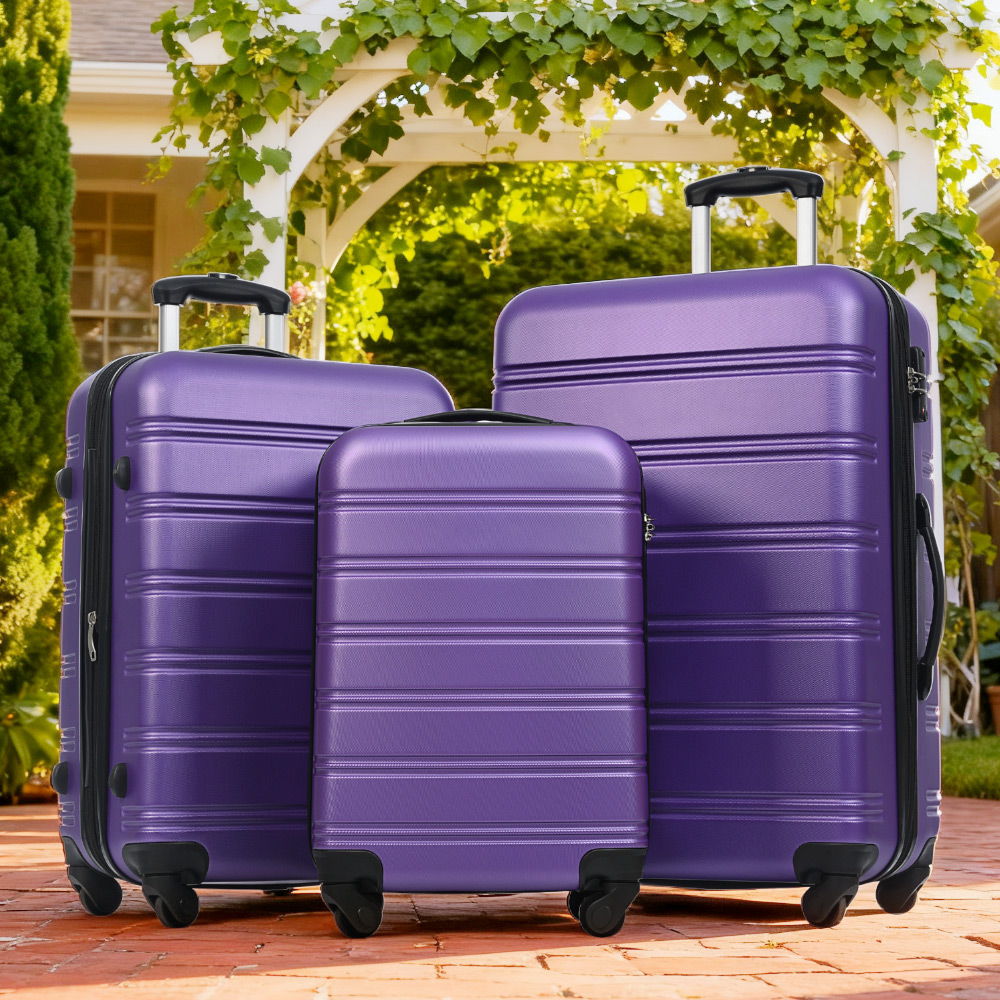 HouseOfZazla 3-piece hardside spinner luggage set in blue, purple, pink, and beige with TSA locks