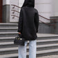 Alaska Outerwear Company Grazia reversible black faux shearling hooded coat parka shown front view