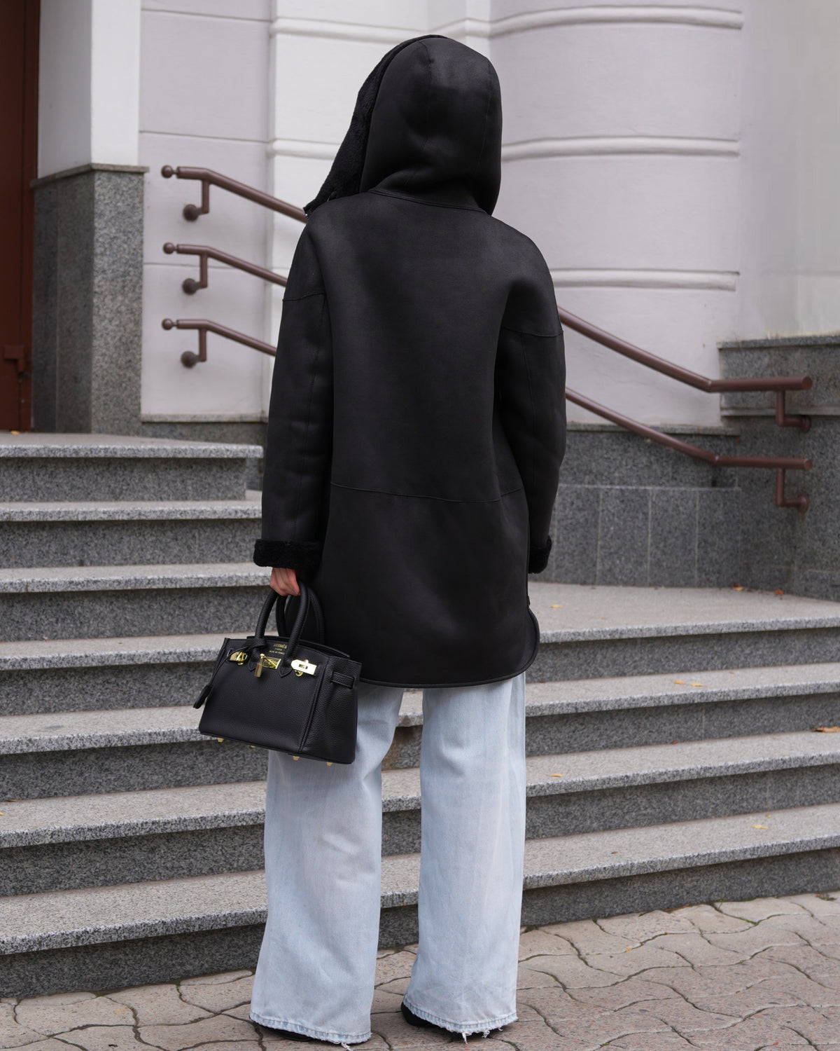 Alaska Outerwear Company Grazia reversible black faux shearling hooded coat parka shown front view