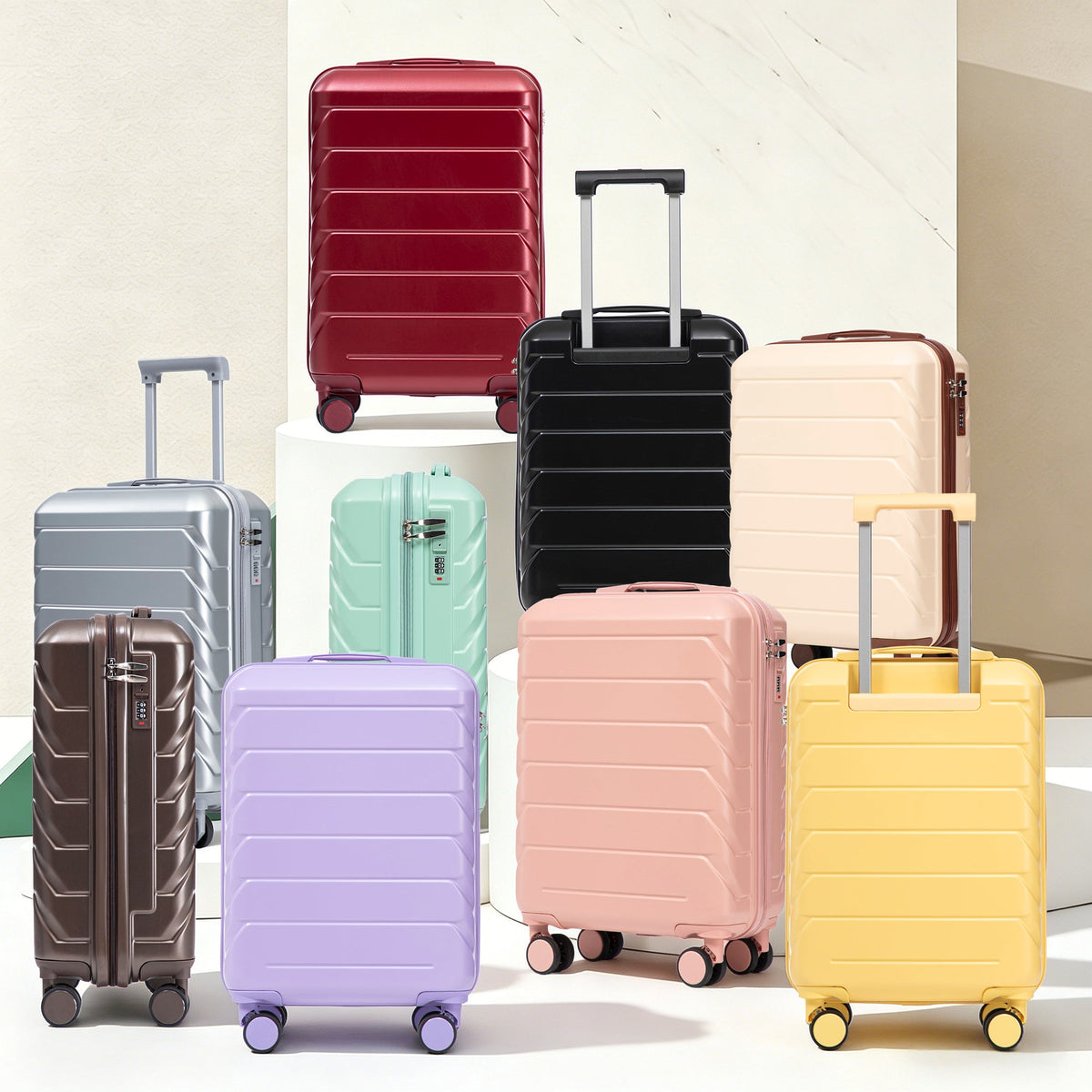 HouseOfZazla 20-inch silver ABS hard shell luggage with four spinner wheels