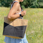 Carry Courage ADVOCATE zippered tote in coal black fabric with sturdy handles and secure top zipper