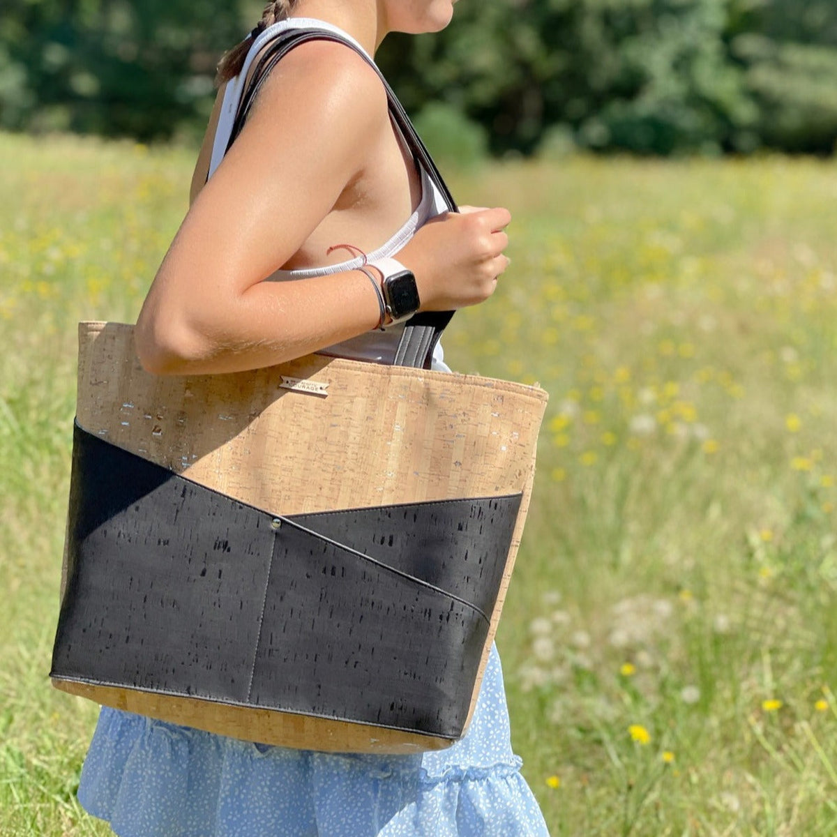Carry Courage ADVOCATE zippered tote in coal black fabric with sturdy handles and secure top zipper