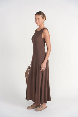 Chocolate sleeveless ribbed dress by Adina Las Vegas, featuring a fitted silhouette and textured fabric.