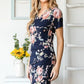 Heimish Full Size Ruched Floral Mini Dress Plus Size - Farnelli