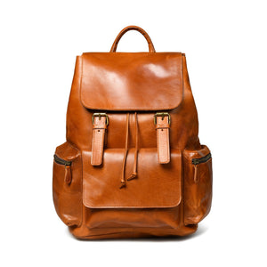 Tan brown Vortex leather backpack by Classy Leather Bags, showing the stylish exterior with adjustable straps and top handle.