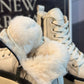 Alaska® Outerwear Company Aspen genuine shearling-lined winter boots with rugged design and warm lining for cold weather.