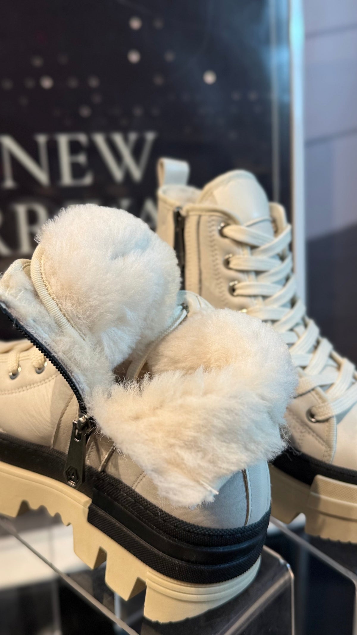 Alaska® Outerwear Company Aspen genuine shearling-lined winter boots with rugged design and warm lining for cold weather.