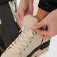 Alaska® Outerwear Company Aspen genuine shearling lined winter boots with rugged sole and fur trim, suitable for cold weather.