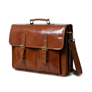 Brown leather briefcase from Classy Leather Bags' The Architect Executive collection, featuring sturdy handles and sleek design.