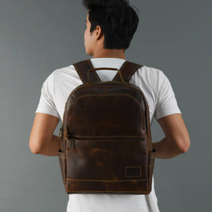Classy Leather Bags MaheTri Cambridge unisex buffalo leather backpack with sturdy straps and multiple compartments.
