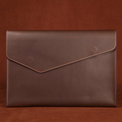 Genuine leather Rirati men's briefcase with large capacity, cowhide design, featuring sturdy handles and multiple compartments.