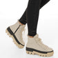 Alaska® Outerwear Company Aspen genuine shearling lined winter boots with leather exterior and sturdy rubber soles.