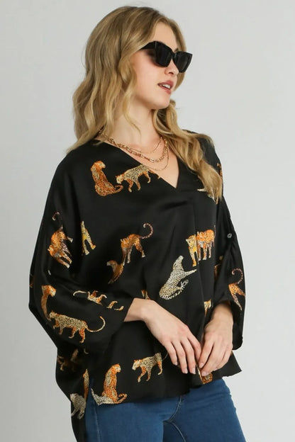 Umgee Full Size High-Low Satin Animal Print V-Neck Blouse Plus Size - Farnelli