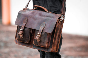 Fullgrain buffalo leather messenger bag by Classy Leather Bags, featuring a classic design with durable leather straps and spacious interior.