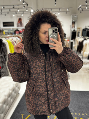 Alaska® Outerwear Company Ember genuine fur trim down fill parka in Leo, featuring a warm coat with fur-lined hood and stylish design.