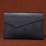 Genuine leather men's briefcase by Rirati with large capacity, crafted from cowhide leather, featuring multiple compartments and sturdy handles.