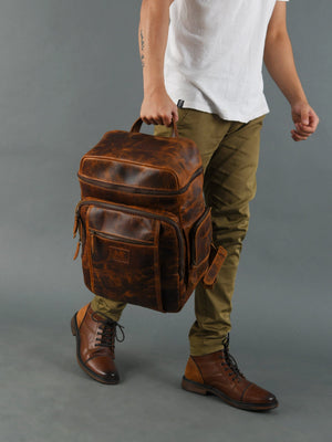 Classy Leather Bags Alpha Caramel Buffalo Leather Travel Backpack with multiple compartments and adjustable straps.