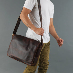 Classy Leather Bags Kayden Messenger Bag showing adjustable shoulder strap, front pocket, and classic leather finish.