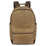 Double Oak Essentials travel backpack with multiple compartments and padded straps, designed for comfortable carrying on journeys.