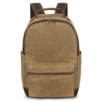 Double Oak Essentials travel backpack with multiple compartments and padded straps, designed for comfortable carrying on journeys.
