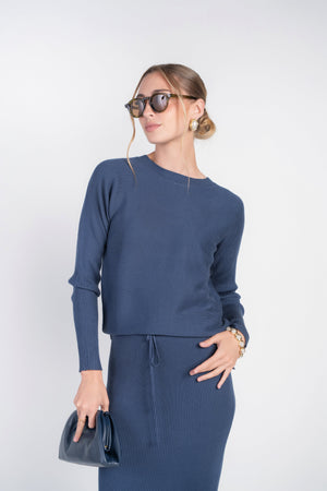 Adina Las Vegas Moonbeam sweater rib top, featuring a cozy knit design and fitted silhouette in soft, neutral tones.