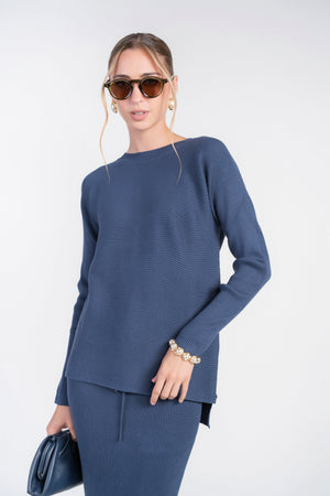 Adina Las Vegas Rib Sweater Top in Moonbeam color, featuring a cozy, fitted design with ribbed texture and long sleeves.