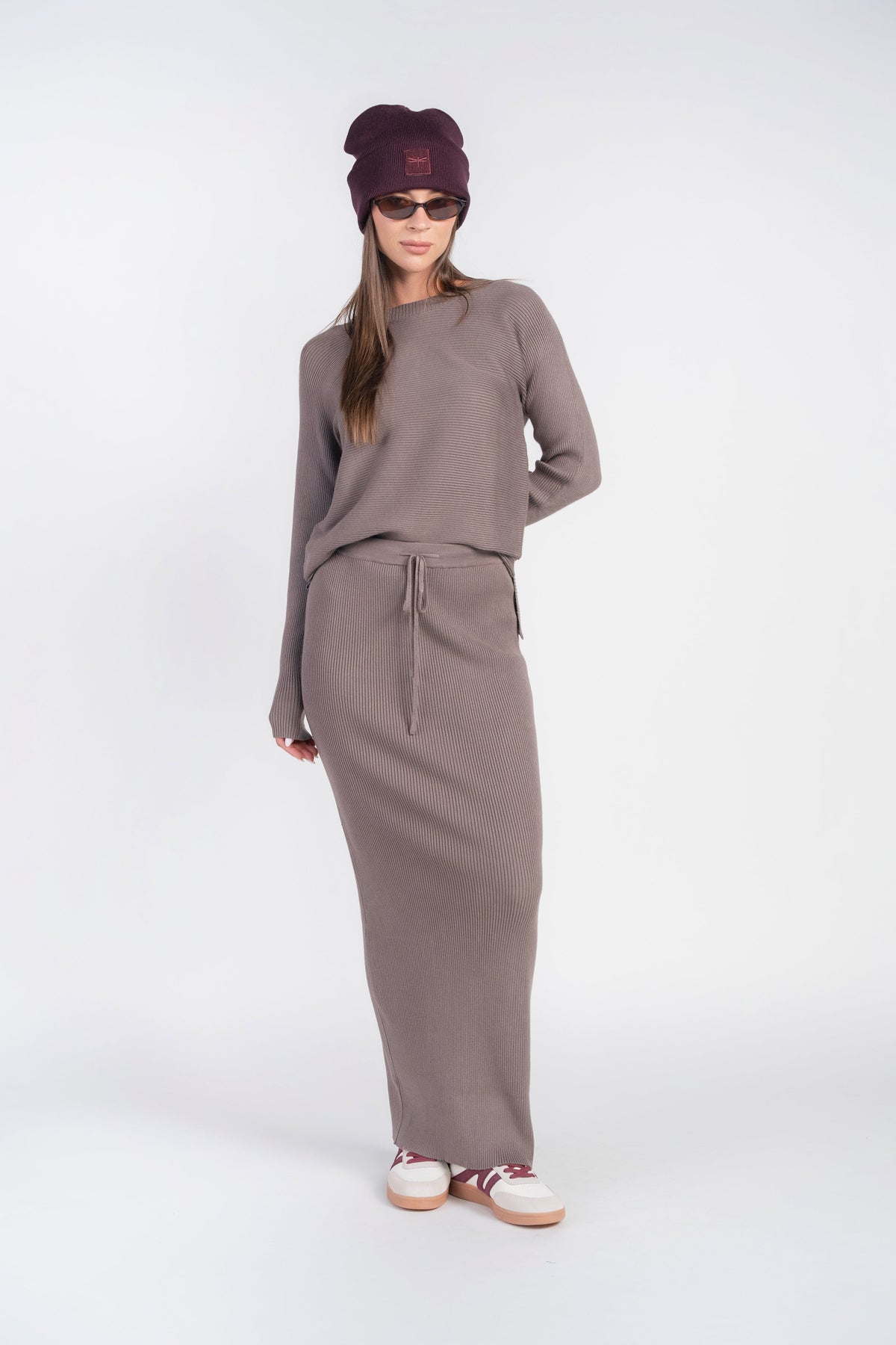 Adina Las Vegas ribbed sweater top in mushroom color, featuring a cozy, fitted design and textured knit fabric.
