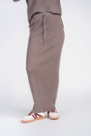Adina Las Vegas Ribbed Mushroom Sweater Skirt showing a high-waisted, textured knit skirt in earthy mushroom color.