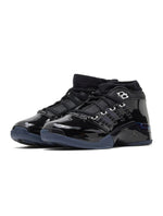 Black patent Air Jordan Men's 17 Low SP sneakers with sleek design and stylish detailing, showcasing modern men's footwear.