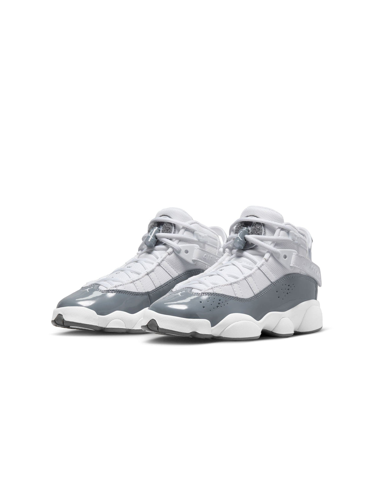 White and cool grey Air Jordan 6 Rings grade school sneakers with Nike branding and stylish design, suitable for big kids.