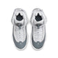 White and cool grey Air Jordan 6 Rings grade school sneakers by Denim Exchange, featuring sleek design and athletic style.