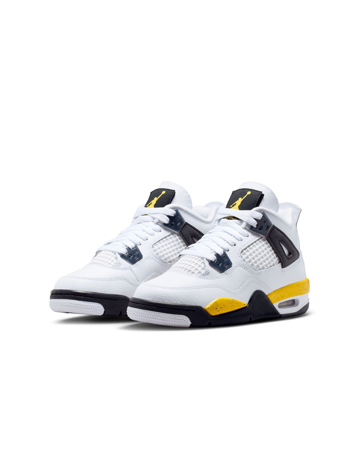 Gradeschool Air Jordan 4 Retro sneakers in tour yellow with black accents, showcasing a stylish basketball shoe design.