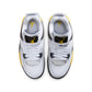 Gradeschool Air Jordan 4 Retro shoes in Tour Yellow with black accents, featuring a classic basketball sneaker design.