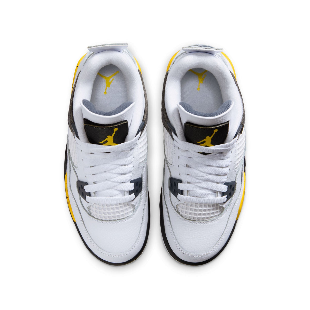 Gradeschool Air Jordan 4 Retro shoes in Tour Yellow with black accents, featuring a classic basketball sneaker design.
