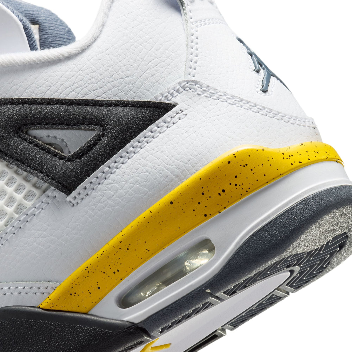 Gradeschool Air Jordan 4 Retro sneakers in Tour Yellow, showcasing the iconic design with yellow accents and premium materials.