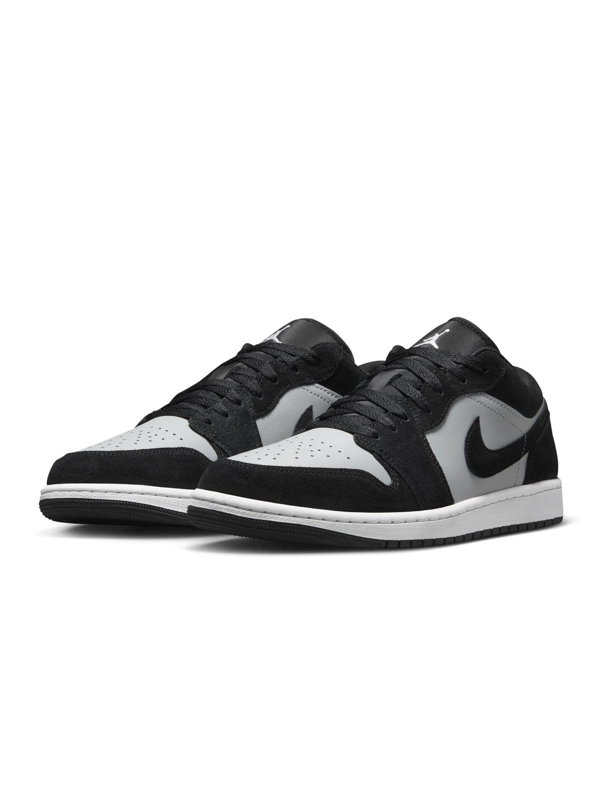 Men’s Air Jordan 1 Low sneakers in black and white by Denim Exchange