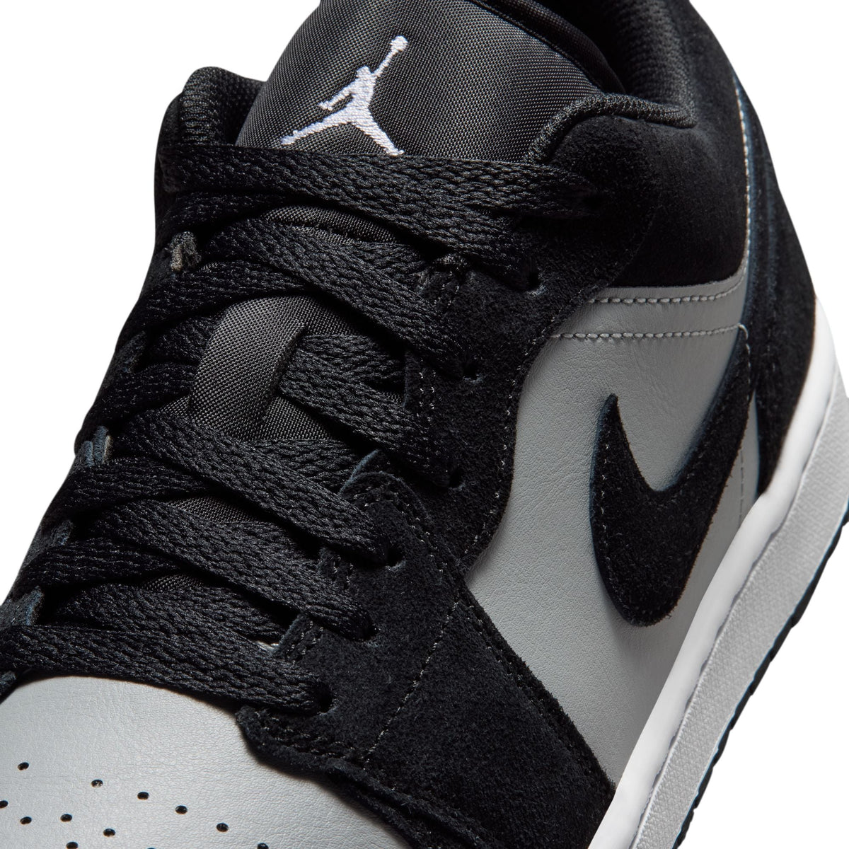 Air Jordan Men's 1 Low black and white sneakers by Denim Exchange