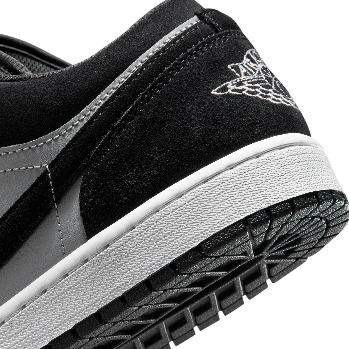 Men's Air Jordan 1 Low sneakers in black and white by Denim Exchange