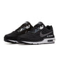 Nike men's Air Max LTD 3 footwear in black and dark grey, side view