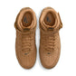Nike men's Air Force 1 Mid Flax sneakers in tan leather with padded ankle collar and classic mid-top design