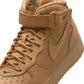 Nike Men's Air Force 1 Mid Flax sneakers in tan leather with mid-top design and classic swoosh detailing