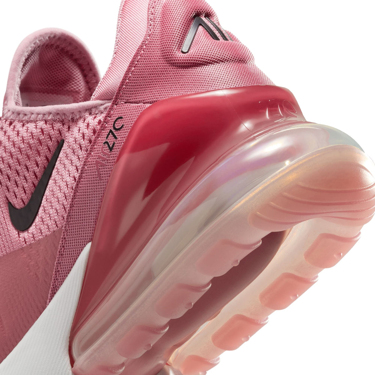 Nike Women's Air Max 270 sneakers in Elemental Pink, showcasing the stylish pink and white design on a casual footwear pair.