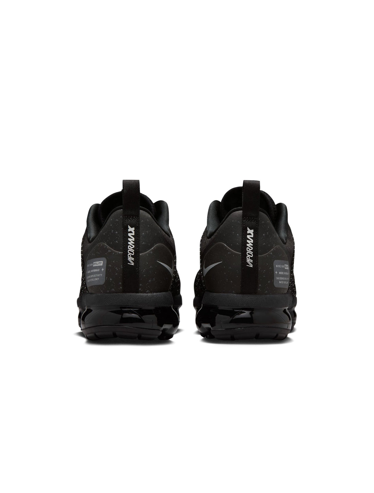 Nike men's Air Vapormax Run Utility sneakers in black with reflective silver accents, showcasing lightweight athletic footwear.