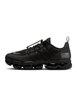 Nike men's Air Vapormax Run Utility sneakers in black with reflective silver accents, showcasing sporty footwear design.