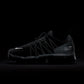 Nike men's Air Vapormax Run Utility sneakers in black and reflect silver, featuring a sleek design and breathable mesh upper.