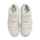 Women’s Air Jordan 11 Retro Pearl sneakers in white and pearl tones, featuring sleek design and high-top style.