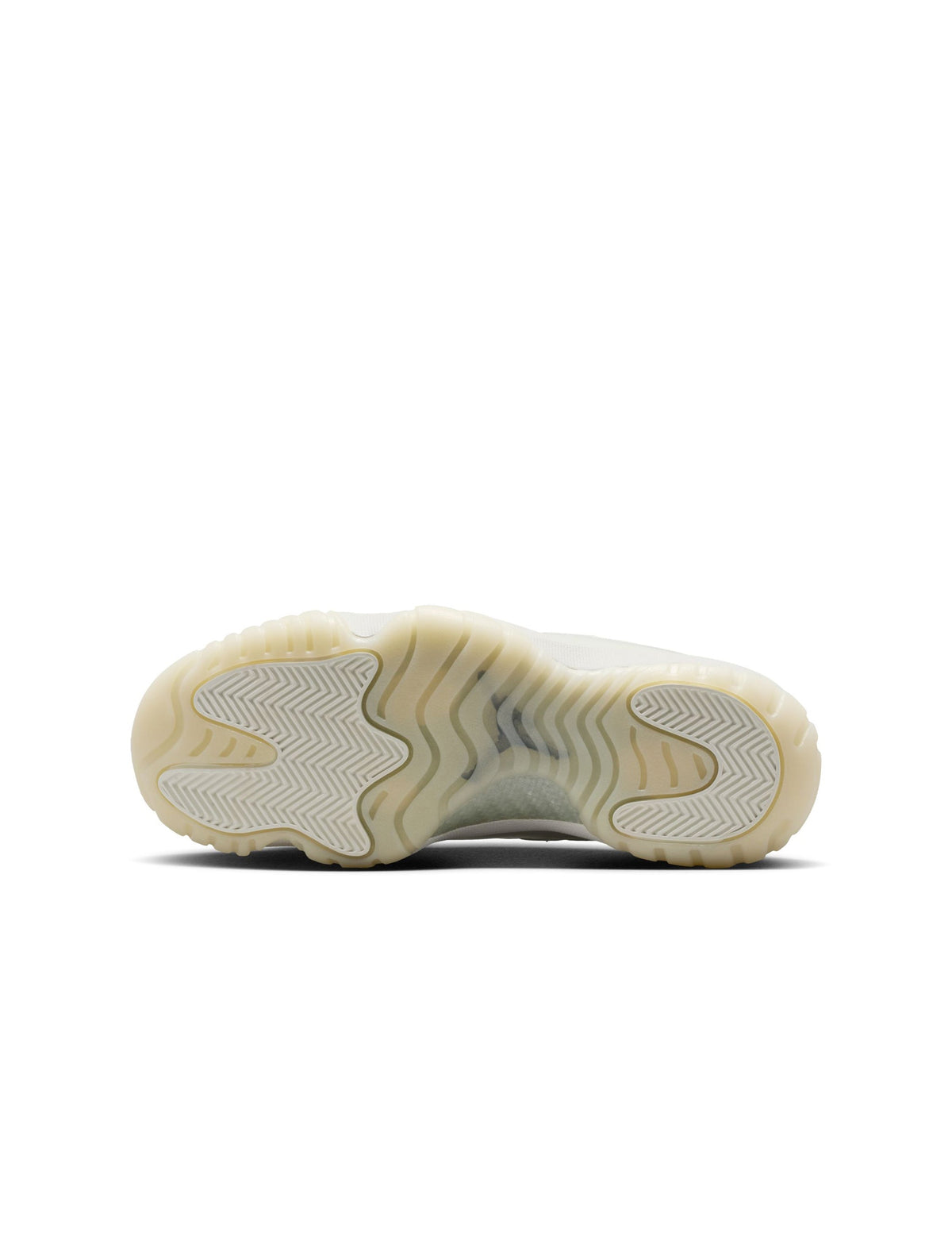 Women's Air Jordan 11 Retro Pearl sneakers in light-colored leather and patent finish, showcasing stylish footwear design.
