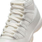 Women's Air Jordan 11 Retro Pearl sneakers featuring a sleek design and pearl accents, displayed on a clean background.