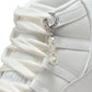 Women's Air Jordan 11 Retro Pearl sneakers featuring white patent leather and icy blue accents, stylish women's footwear by Denim Exchange.