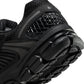 Nike men's Zoom Vomero 5 Triple Black sneakers by Denim Exchange, side view with layered mesh and black sole
